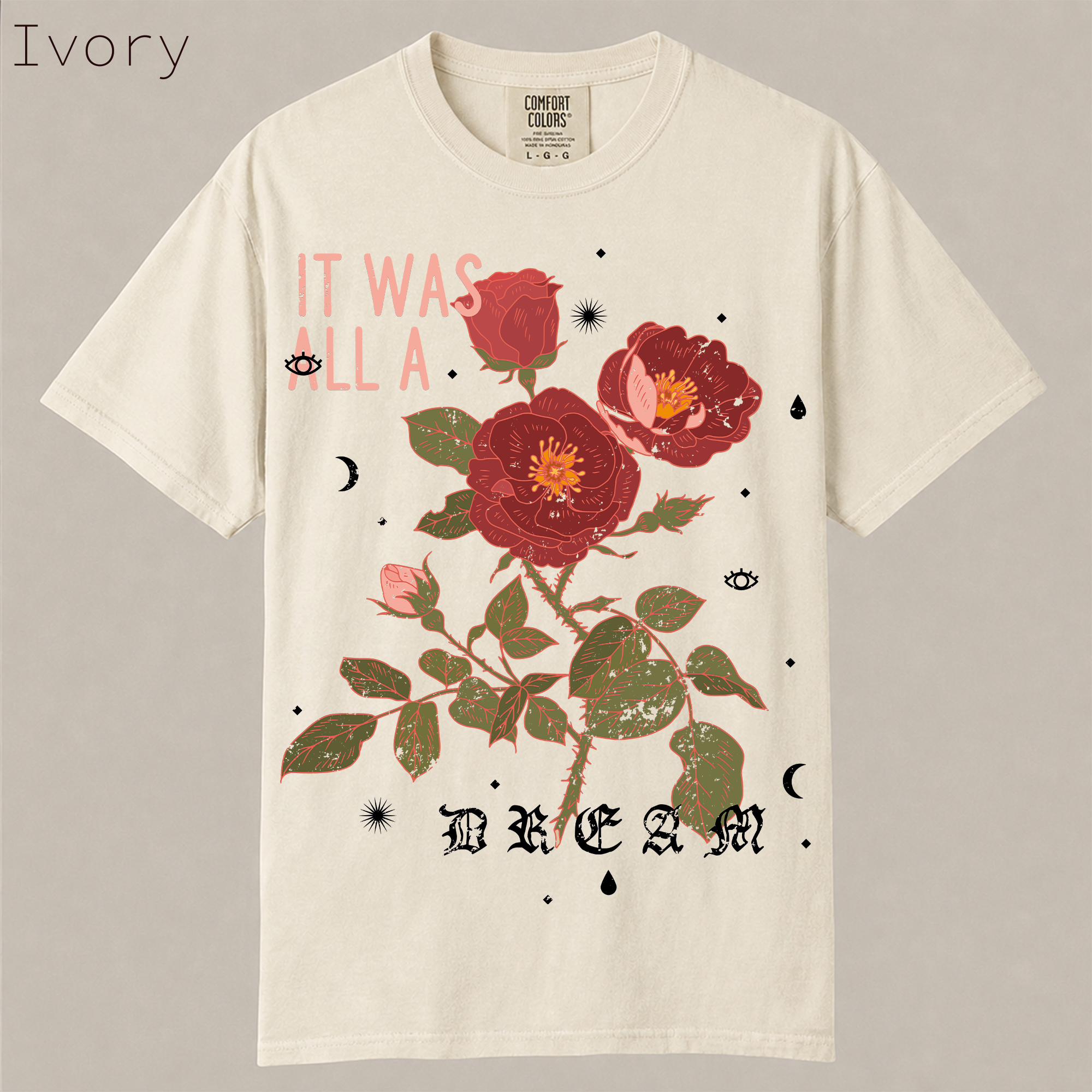 Shop It Was All A Dream rose tee. Vintage gothic floral graphic with celestial details, distressed aesthetic on soft garment-dyed cotton. Alternative floral shirt.