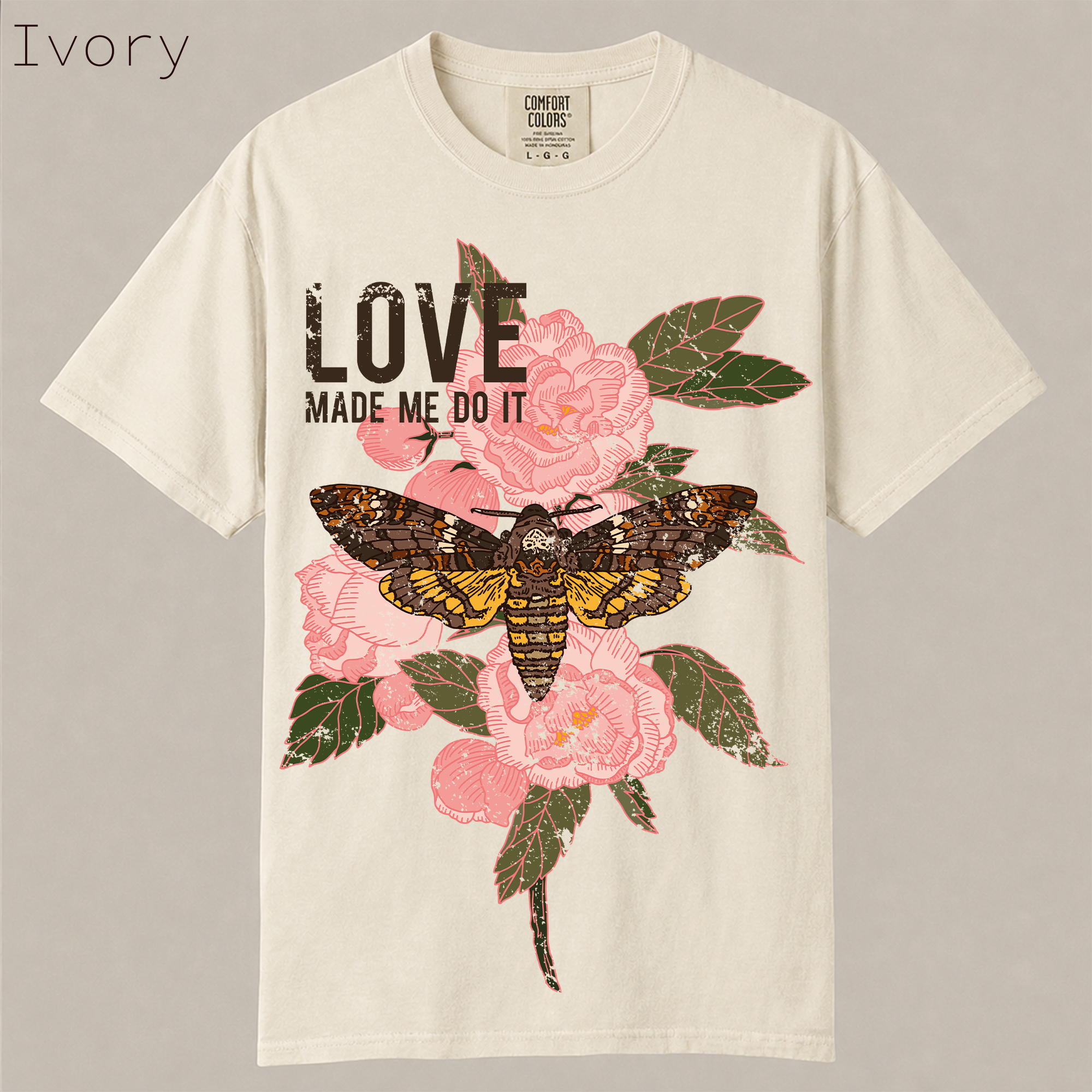 Love Made Me Do It moth floral shirt. Vintage pink peony and death's head moth graphic tee. Perfect dark academia, cottagecore aesthetic on soft garment-dyed cotton.