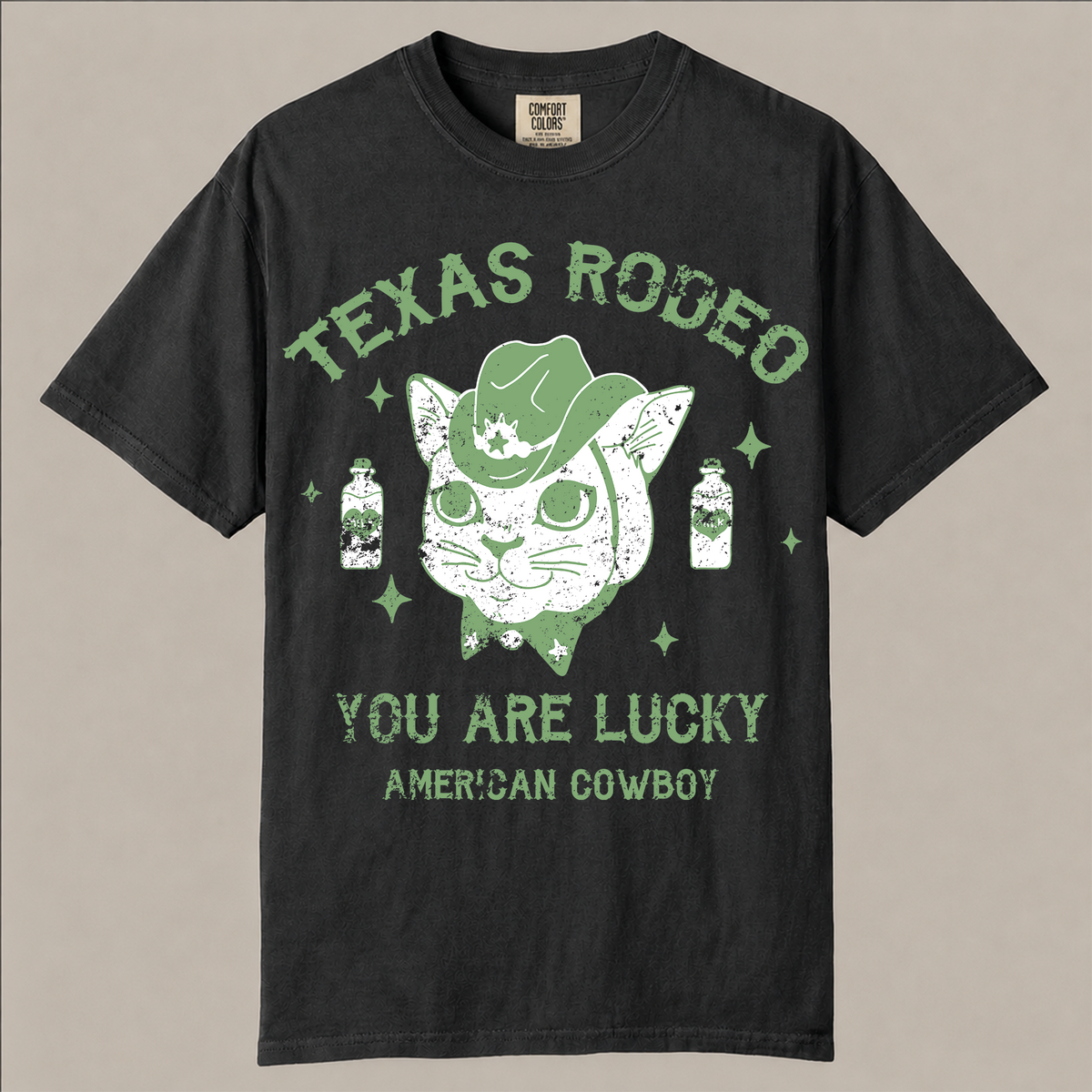 Texas Rodeo cowboy cat shirt. Cute western cat with cowboy hat and milk bottles, funny vintage rodeo tee on soft garment-dyed cotton.